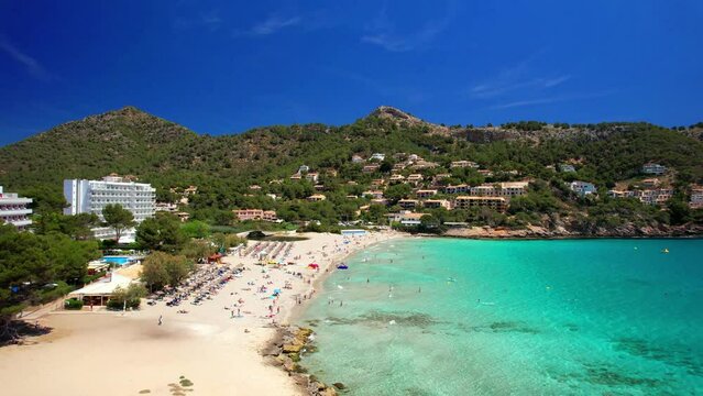 Spain Mallorca 4K Aerial Drone Video of Canyamel Beach with Crystal Clear Turquoise Water Scenic Mediterranean Coastline Balearic Islands Summer Luxury Travel Destination