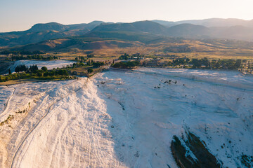 Limestone mineral formations in Pamukkale at the morning, Turkey. Aerial