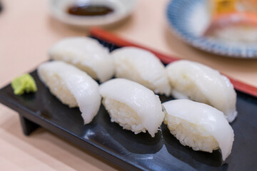 Japanese sushi set. Sushi Engawa on plate. Fluke Fin Sashimi. Engawa (fin of flatfish).