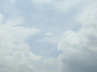 Puffy cumulus clouds forming within a blue sky over Kent County, Delaware. 