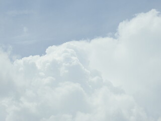 Puffy cumulus clouds forming within a blue sky over Kent County, Delaware. 