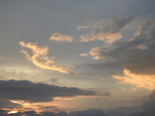 Evening clouds highlighted by the sun over Kent County, Delaware. Cloudscape.