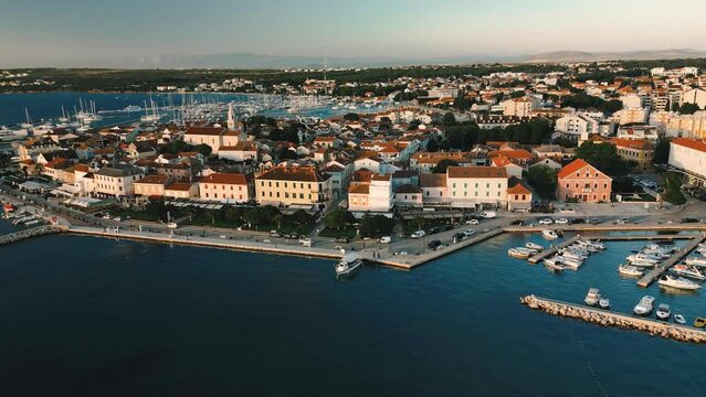 Biograd na Moru, aerial above view of luxury yachts and ships in port, waterfront historic buildings of Old Town. Beautiful destination for travel on Adriatic Sea coast, Dalmatia region of Croatia