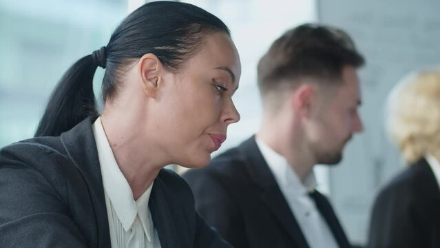 Group meeting of businessman people in office. Company meeting for brainstorm in big office. Woman talk about prespective ideas for new projects.