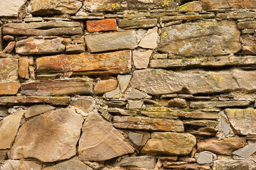 Striped and rectangular stone wall pattern, texture. Horizontal photo. background and mapping
