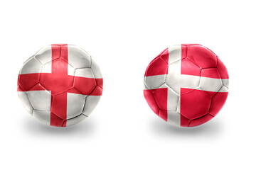 Obraz premium football balls with national flags of england and denmark ,soccer teams. on the white background.