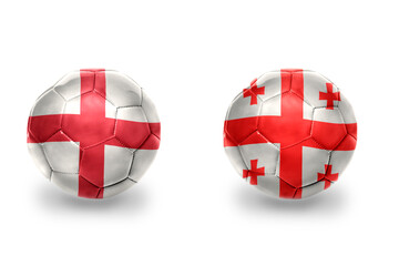 Obraz premium football balls with national flags of england and georgia ,soccer teams. on the white background.