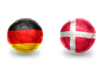 football balls with national flags of germany and denmark ,soccer teams. on the white background.