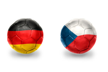 Fototapeta premium football balls with national flags of germany and czech republic ,soccer teams. on the white background.