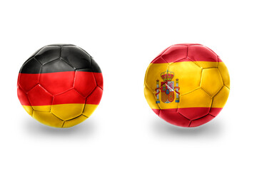 Fototapeta premium football balls with national flags of germany and spain ,soccer teams. on the white background.