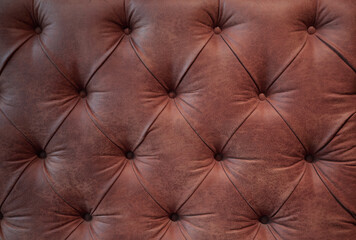 Fototapeta premium upholstery of vintage leather sofa.