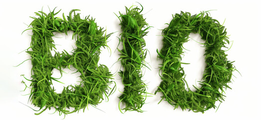 Green BIO letters in grass on white background represent ecoconsciousness and nature