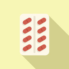 Red tablets are sitting in a blister pack, suggesting the consumption of medication