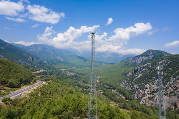 Telecommunication tower Antenna in mountains countryside. Technology of the telecommunication GSM 5G and 4G tower