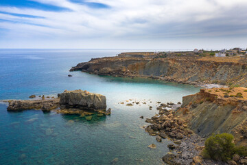 Famous sandy beach of Kalo Nero and Staousa near Makris Gialos, Crete, Greece.