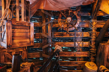 interior inside the wooden captain cabin on an ancient medieval pirate ship