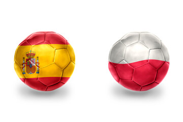 football balls with national flags of spain and poland ,soccer teams. on the white background.