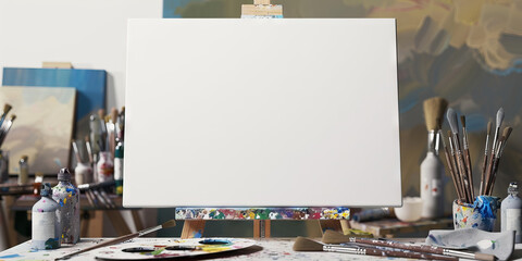 Artist's Canvas: An empty easel with an artist's palette and paintbrushes in front of a large white canvas.