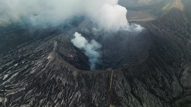 Beautiful view of Bromo volcano in Java, Indonesia drone aerial footage