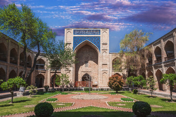courtyard of ancient Uzbek Kukeldash Madrasah in Tashkent in Uzbekistan. Old medieval Islamic...