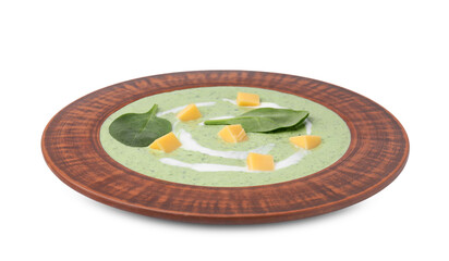 Delicious spinach cream soup with leaves and cheese in bowl isolated on white
