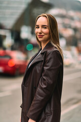 A Casual Girl Poses with Confidence and Style on Urban Streets