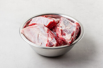 Raw beef ribs in bowl