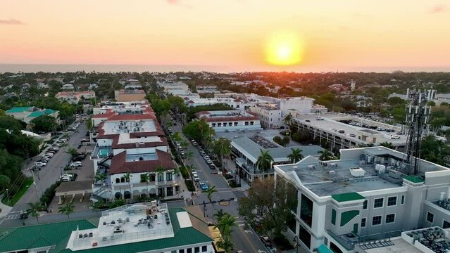aerial high above downtown naples florida at sunset