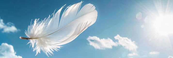 Obraz premium white feather floating in the air against a blue sky background, generative AI
