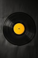 Obraz premium A black record with red swirls on it. The table is dark