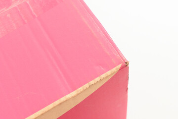 pink cardboard box on white background, recycle material