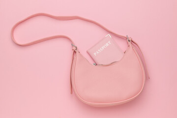 Pink Handbag with Passport on Pink Background - Travel Essentials, Minimalist Style, Fashion