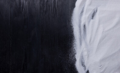 White sand on black wooden floor,Top view with copy space