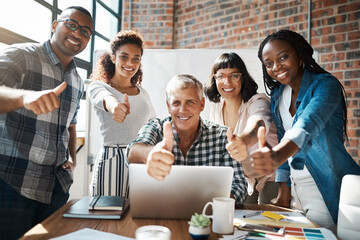 Thumbs up, laptop and portrait of happy business people in office for collaboration, about us and teamwork. Creative office, diversity and men and women with gesture for success, winning or promotion