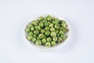 raw turkeyberry on a white background with studio lighting