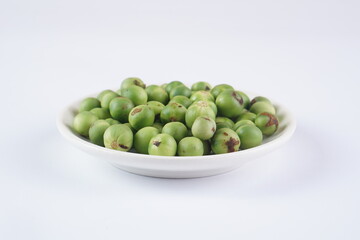 raw turkeyberry on a white background with studio lighting