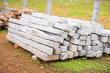 stack of stone fencing pole