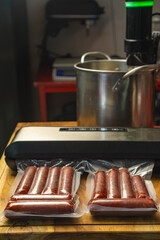 Food Safety - Preserving smoked sausagein a Plastic Bag with a Vacuume Sealer, before deep frozen it