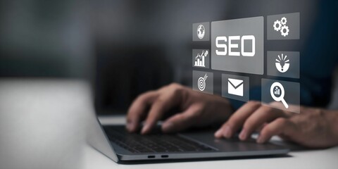 A businessman using laptop on seo concept visual screen