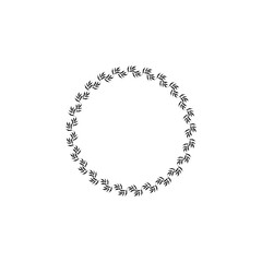 A black and white image of a wreath of leaves. The leaves are arranged in a circle and are very thin