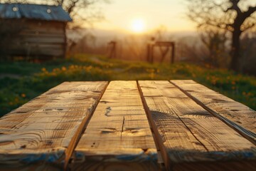Fototapeta premium Wooden table at sunset