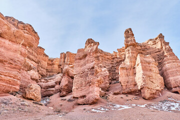 Fototapeta premium Bizarre shapes from sandstone.Castles Gorge, National Natural Park Charyn Canyon in Kazakhstan.