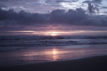 Fototapeta premium Sunset view on a quiet white sandy beach