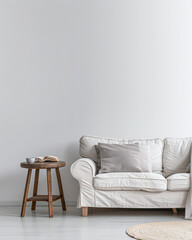 Bright minimalist living room in a luxury home with stylish minimal furniture and natural lighting. Home decor minimalist composition in neutral tonality.
