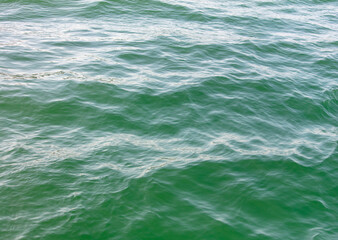 Turquoise water in the sea as an abstract background. Texture
