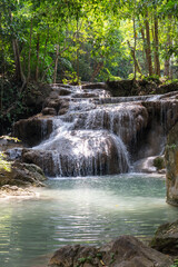 Naklejka premium Waterfall along a tropical river in Thailand