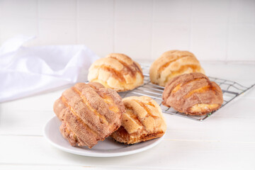 Mexican traditional conchas pastry, cookie or bread bun