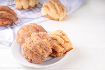 Mexican traditional conchas pastry, cookie or bread bun