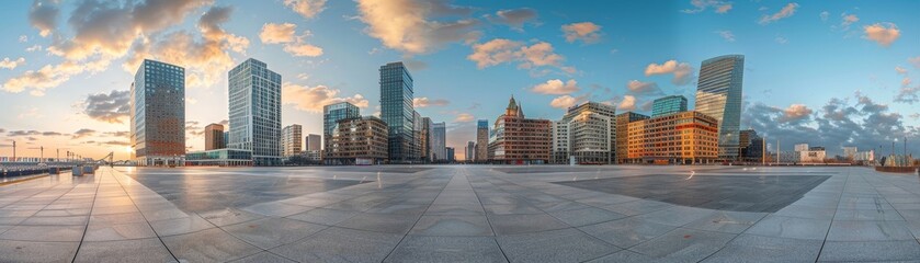 A city skyline with a large empty plaza in the middle. The sky is clear and blue, and the buildings are tall and modern. The plaza is surrounded by trees, giving it a peaceful and serene atmosphere