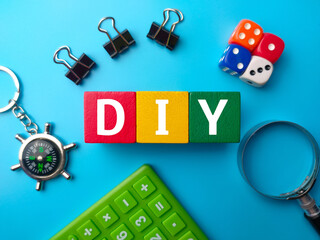 Top view colored wooden block with the word DIY Do It Yourself
